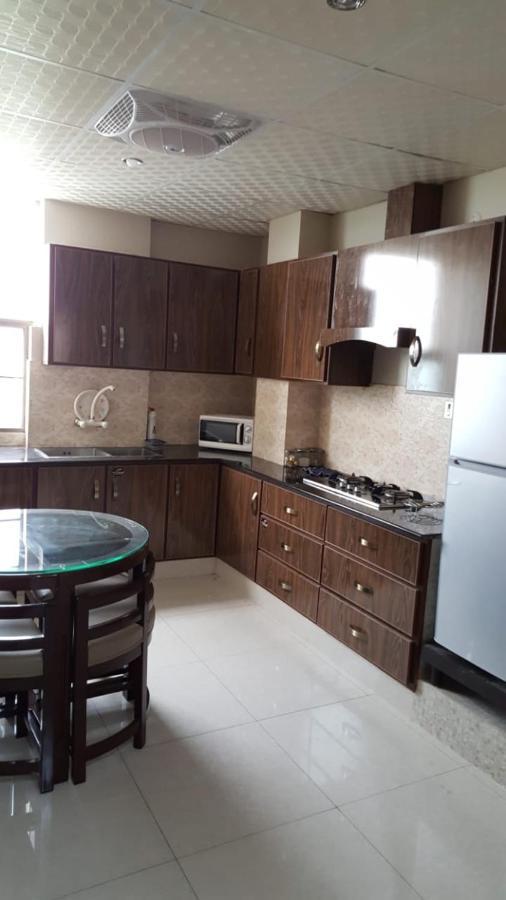 • Faizi Furnished Apartments Файсалабад Екстер'єр фото